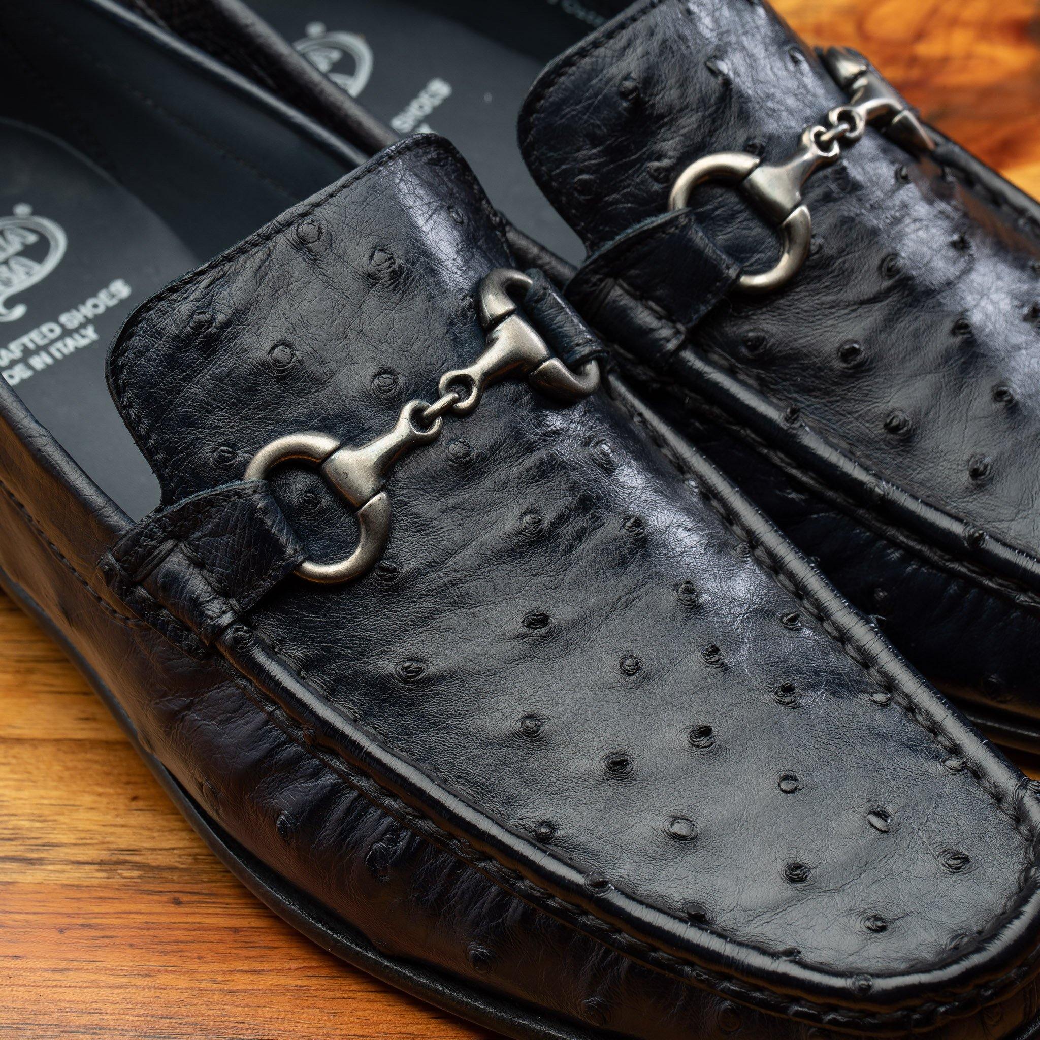 Up close photo showing the nickel horsebit buckle and ostrich quill of the 3238-M Calzoleria Toscana Ostrich Dress Slip-On